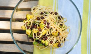 avocado and black beans tossed with noodles