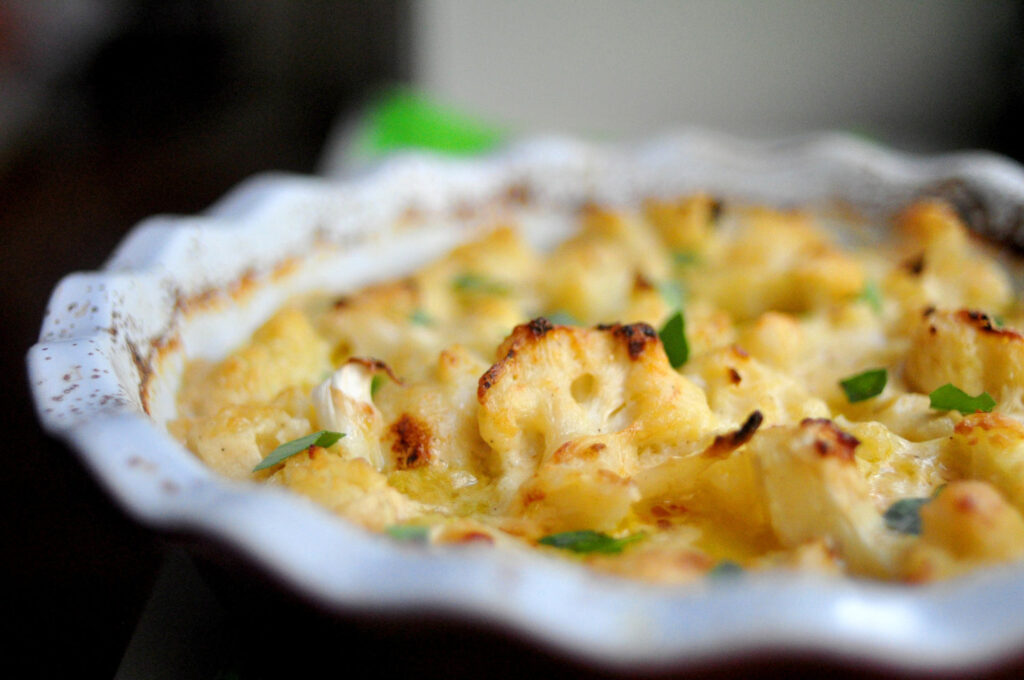 cauliflower baked in a cheese sauce served in a pie dish