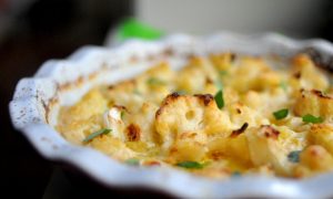 cauliflower baked in a cheese sauce served in a pie dish