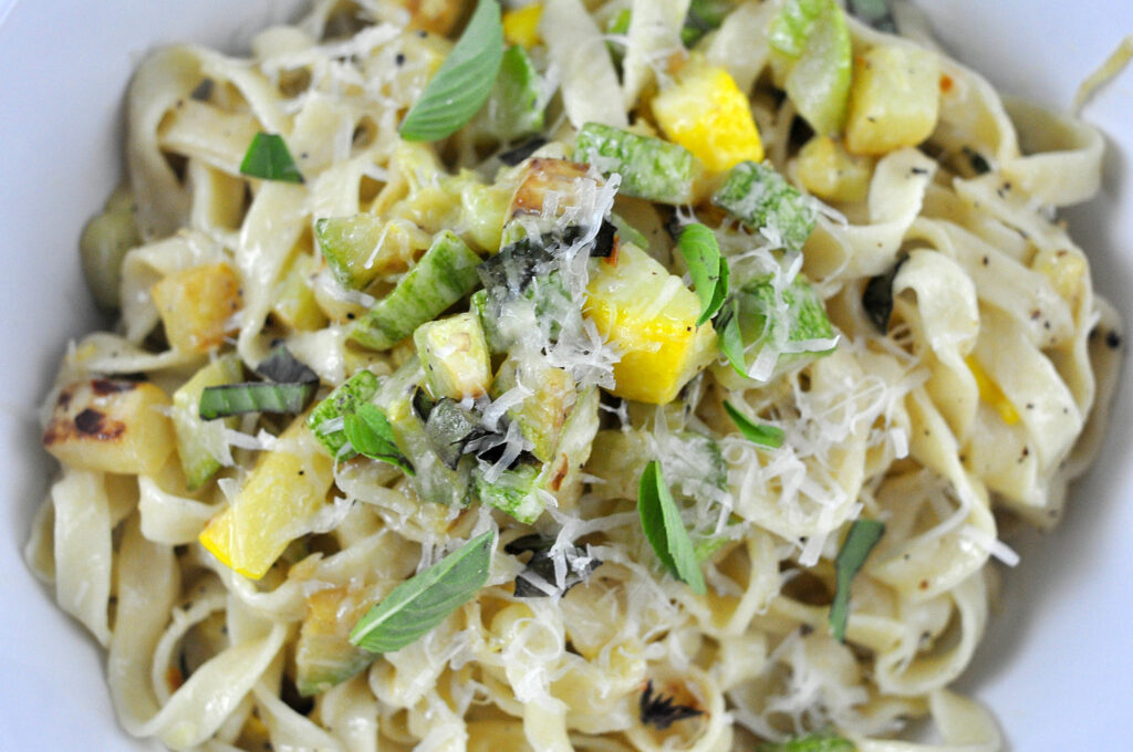 fettucine tossed with zucchini in a rich cream sauce