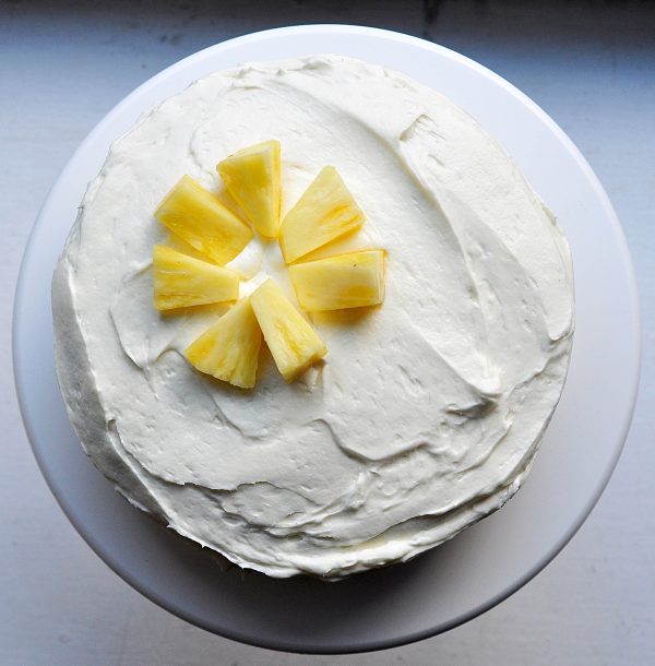 carrot-pineapple cake frosted with pineapple flower on top